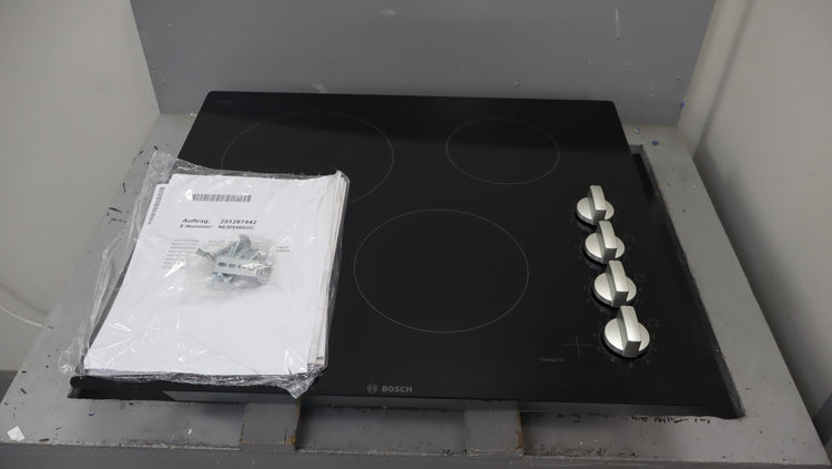 Bosch 24" 500 Series Infinite Temp Control Blk Glass Electric Cooktop NEM5466UC