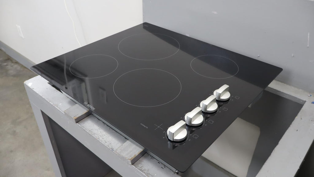Bosch 24" 500 Series Infinite Temp Control Blk Glass Electric Cooktop NEM5466UC