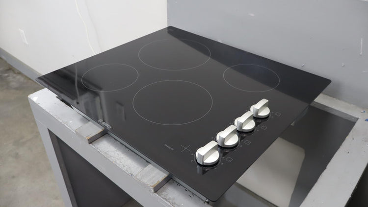 Bosch 24" 500 Series Infinite Temp Control Blk Glass Electric Cooktop NEM5466UC